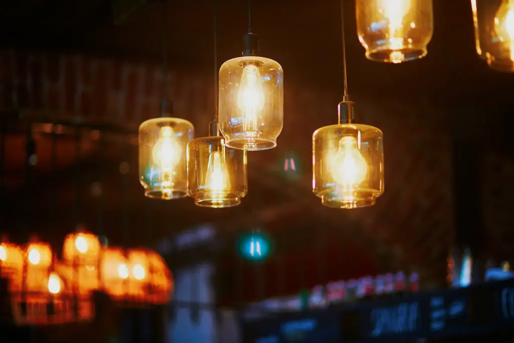 Solar light idea #5: Whimsical Hanging Jar Lights